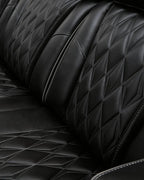 Black Leather Power Recliner With Adjustable Headrest